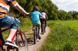 Family riding bikes