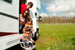 Family vacation in camping. Travel on motorhome with kids