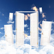 White door against blue sky background White door against blue sky background