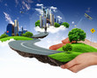 Illustration: Human hand holding a green landscape Human hand holding a green landscape