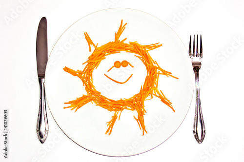 Photo: carrot summer vitamins salad plate close up isolated carrot summer vitamins salad plate close up isolated
