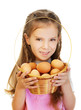 little girl holding basket of raw eggs