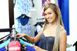 Young girl buying clothes Young girl buying clothes