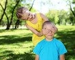 Foto: Little friends in the summer park Little friends in the summer park
