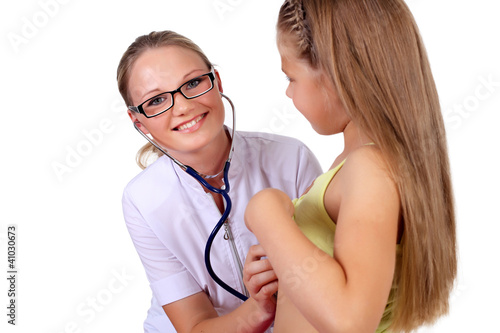Foto: Doctor doing medical examination to a child Doctor doing medical examination to a child