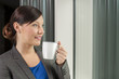 Business woman drinking coffee