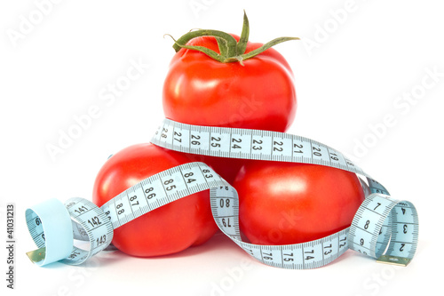 Photo: tomatoes wrapped with measuring tape tomatoes wrapped with measuring tape
