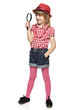 Full length of little girl with magnifying glass over white