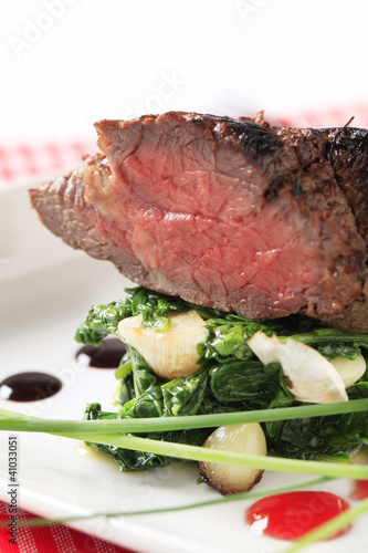 Photo: Roast beef and spinach leaves Roast beef and spinach leaves