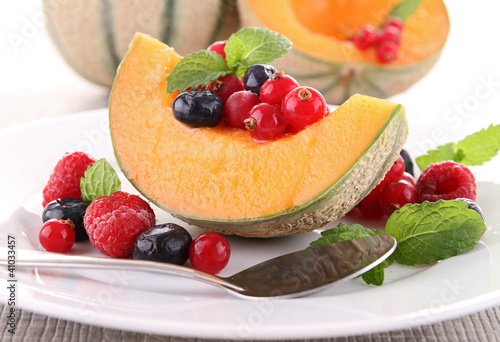 Photo: melon and berries fruits melon and berries fruits