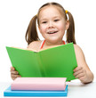 Cute little girl with books