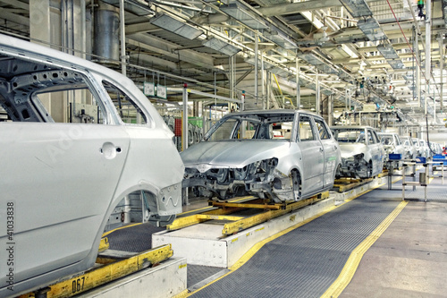 Photo: cars in a row at car plant cars in a row at car plant