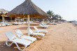 Photo: plastic beach beds on coral bay in Aqaba plastic beach beds on coral bay in Aqaba