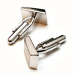 silver cufflinks isolated on white background