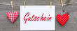 Gutschein mit roten Herzen