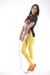 Photo en ligne au meilleur prix Full length of beautiful young girl holding laptop