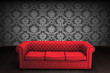 A red vintage chair on damask background