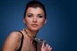 Portrait of luxury woman in exclusive jewelry