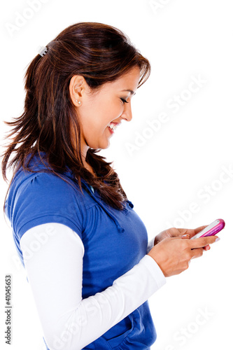 Foto: Woman sending a text message Woman sending a text message