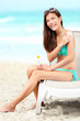 Suntan lotion - woman applying sunscreen