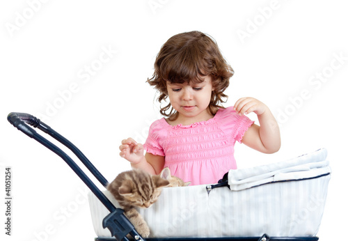 Photo: funny child nursing with attractive kitten funny child nursing with attractive kitten