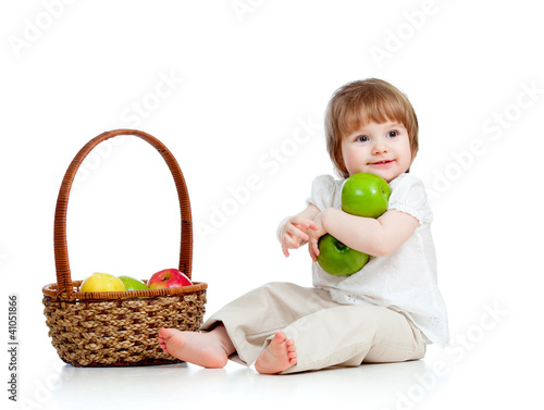 Photo: child with healthy food apples child with healthy food apples