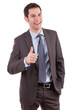 Young caucasian businessman making thumbs up gesture