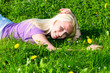 young woman resting on the meadow