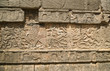 Mayan figures carved into wall at Chichen Itza in Mexico
