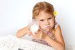 child with a glass of milk