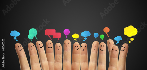 Illustration: Happy group of finger smileys with social chat sign Happy group of finger smileys with social chat sign