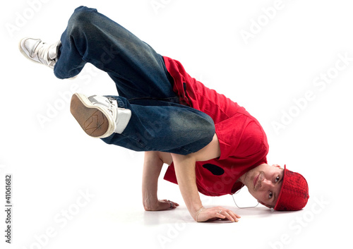 Photo: hip-hop style dancer posing on isolated background hip-hop style dancer posing on isolated background