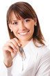 Woman or real estate agent showing keys, on white