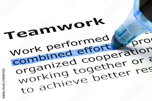 Photo: Teamwork with blue marker Teamwork with blue marker