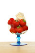 Strawberries and cream in a sundae glass