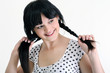 beautiful young woman touching her hair