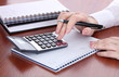 women hands with pencil, notebooks and Calculator women hands with pencil, notebooks and Calculator