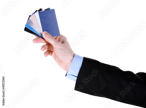 Photo: man hand with credit cards isolated on white man hand with credit cards isolated on white
