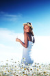 girl in dress on the daisy flowers field girl in dress on the daisy flowers field