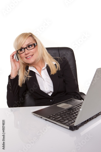 Foto: Businesswoman in glasses working Businesswoman in glasses working