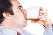 Businessman drinking whisky Businessman drinking whisky