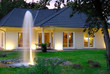 Foto: Einfamilienhaus in der Abenddämmerung Einfamilienhaus in der Abenddämmerung