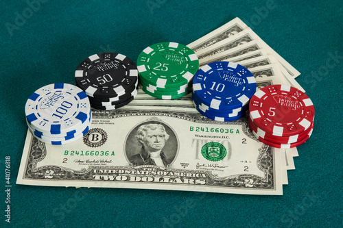 Photo: Dollar bills and casino chips Dollar bills and casino chips