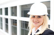 Portrait of woman with construction helmet