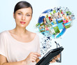 Young pretty woman using her universal device Young pretty woman using her universal device