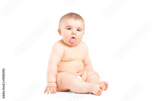 Photo: Baby boy sticking his tongue Baby boy sticking his tongue