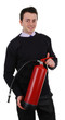 Security guard with a fire extinguisher