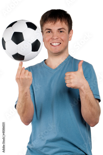 Photo: Man with classic soccer ball Man with classic soccer ball