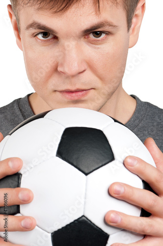 Photo: Man with classic soccer ball Man with classic soccer ball