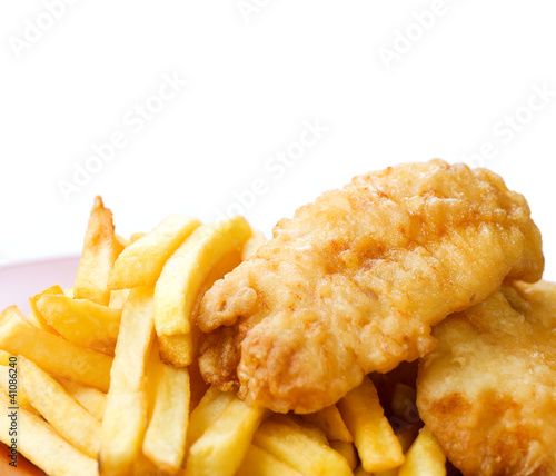 Photo: Fried Fish and Chips isolated on white Fried Fish and Chips isolated on white